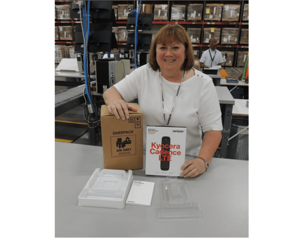 woman displaying custom packaging for Verizon