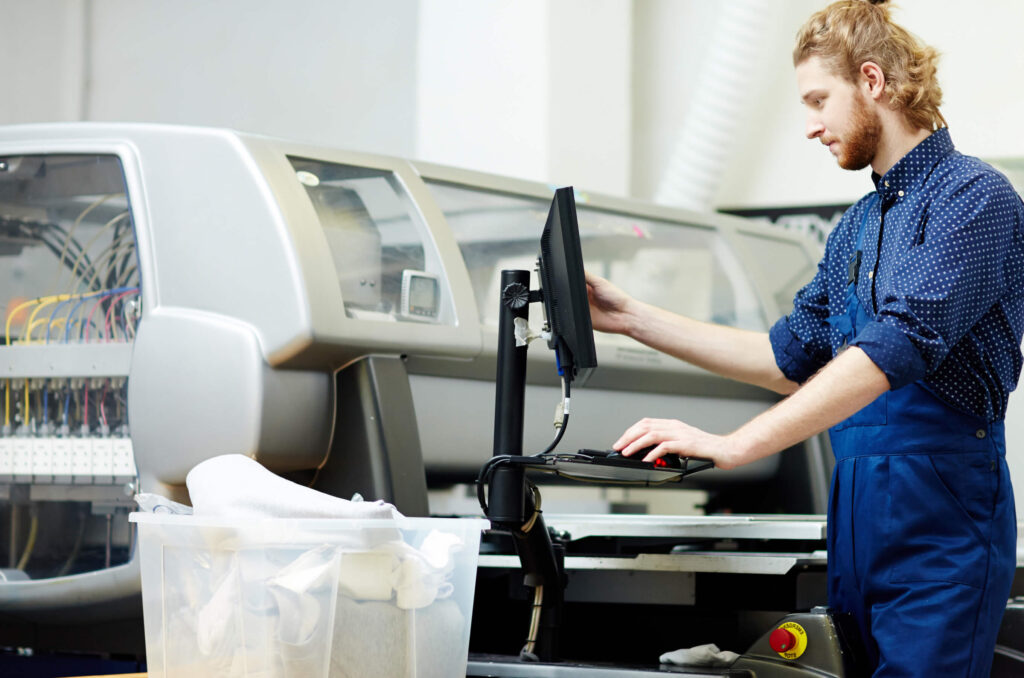 Person using a CNC computer