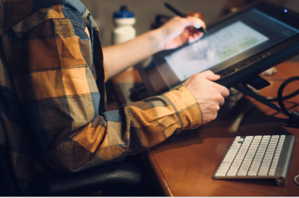 Man working on a touchscreen computer